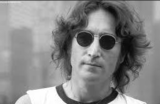 John Lennon in black glasses black and white pic